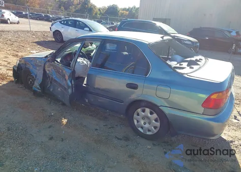 2000 Honda Civic Lx from USA, damaged, VIN 1HGEJ6571YL037355